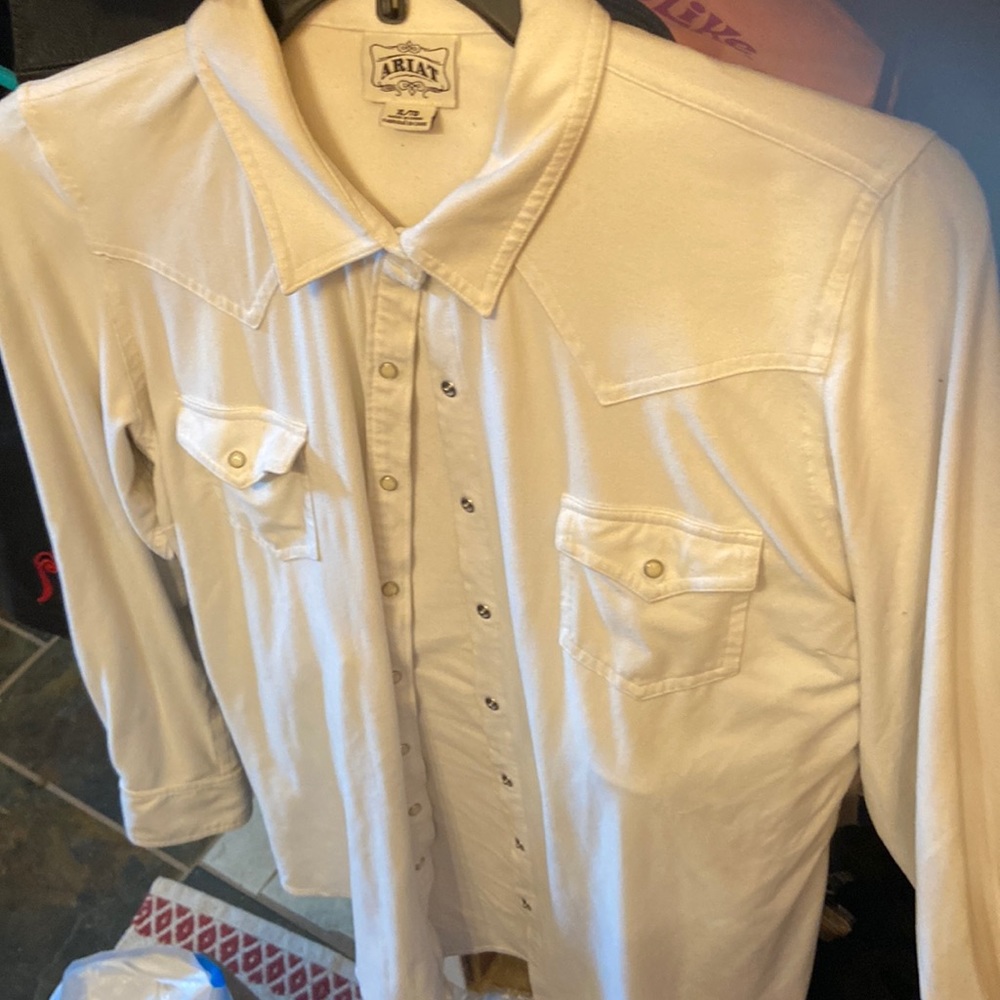 Western style soft and fuzzy like suede but stretchy. Pearl colored snaps.